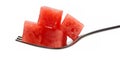 A fork with juicy watermelon cubes, capturing the essence of summer in a refreshing close-up shot. isolated on white