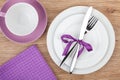 Fork with knife over plates Royalty Free Stock Photo