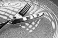 Fork and knife on a plate