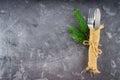 Fork with a knife in the sacking on a gray background Royalty Free Stock Photo