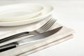 Fork and knife on table, closeup Royalty Free Stock Photo