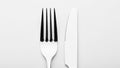 The fork on the left and the knife on the right suggesting a Royalty Free Stock Photo