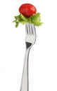 Fork with letucce and tomato Royalty Free Stock Photo