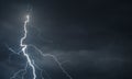 Fork lightning striking down during summer storm Royalty Free Stock Photo