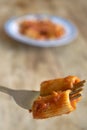 fork with rigatoni pasta with tomato sauce Royalty Free Stock Photo