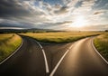 Fork in the road landscape sunset sky choose your path decision future opportunity Royalty Free Stock Photo