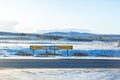 Fork road sign directions path in iceland in winter Royalty Free Stock Photo