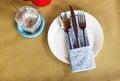 Fork-spoon-knife on white plate Royalty Free Stock Photo