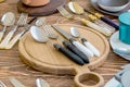 Fork Spoon Table Knife on the wooden Cutting board