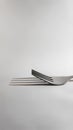 Fork spoon in white background, creative kitchen utensils photography, kitchenware photography. Royalty Free Stock Photo