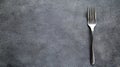 A fork on a table. Royalty Free Stock Photo