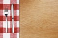 Fork and tableknife on red gingham tablecloth Royalty Free Stock Photo