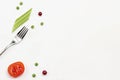 Fork, tomato, cranberry and celery stems on white background Royalty Free Stock Photo