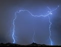 Forked Lightning over Desert Mountains