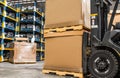 Forklift cardboard boxes in a store warehouse automotive part