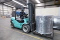 Forklift carrying cargo Royalty Free Stock Photo