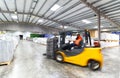 forklift driver in a logistics hall of a chemical warehouse Royalty Free Stock Photo