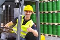 Forklift driver in a logistics hall of a chemical warehouse Royalty Free Stock Photo