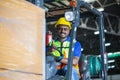 Forklift driver showing thumbs up, Worker on forklift, Manual workers working in warehouse, Worker driver at warehouse forklift