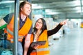 Forklift driver and supervisor at warehouse Royalty Free Stock Photo