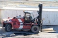 Forklift with empty cab in the shipping port Royalty Free Stock Photo