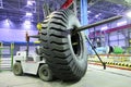 Forklift with giant size tyre Royalty Free Stock Photo