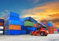 Forklift handling the container box at dockyard