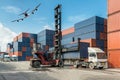 Forklift handling container box loading at docks with truck for Royalty Free Stock Photo