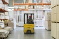 Forklift in a hardware store. Blurry