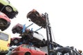 Forklift hoisting car wrecks