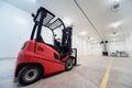 Forklift in a large industrial freezer warehouse. Royalty Free Stock Photo