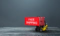 Forklift loaded with free shipping container. World trade, logistics. Attractiveness of purchasing a product, a marketing move. Royalty Free Stock Photo