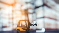 Forklift loader with earphones on pallet close up. Pallet stacker truck equipment at warehouse. Electronic device transportation c Royalty Free Stock Photo