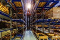 Forklift loader in Modern warehouse interior with shelves and boxes Royalty Free Stock Photo