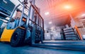 Forklift loader. Pallet stacker truck equipment at warehouse Royalty Free Stock Photo