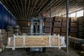 Forklift loader pallet stacker truck at small warehouse