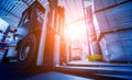 Forklift loader in storage warehouse ship yard. Distribution products. Royalty Free Stock Photo