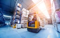 Forklift loader in storage warehouse ship yard. Distribution products. Royalty Free Stock Photo