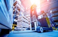 Forklift loader in storage warehouse ship yard. Distribution products. Delivery Royalty Free Stock Photo