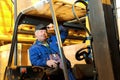 Forklift loader worker at warehouse Royalty Free Stock Photo