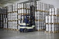 Forklift loading beer kegs in stock brewery Ochakovo