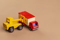 Forklift placing a load on a truck - miniature metal toys