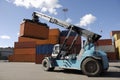 Forklift stacking containers Royalty Free Stock Photo