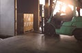 Forklift Tractor Loading Package Boxes into Cargo Container at Dock Warehouse. Delivery Service. Shipping Warehouse Logistics.