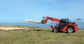 Red forklift logs Royalty Free Stock Photo