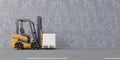 Forklift transporting on a road and concrete wall