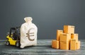 Forklift truck carries a European euro EUR money bag. Profit from trade and exchange of goods. Investments financing in production Royalty Free Stock Photo