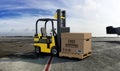 Forklift truck with Free Shipping Box Royalty Free Stock Photo