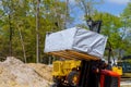 Forklift truck loader palette framing beams with new residential construction house framing