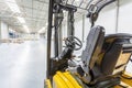 Forklift truck ready to use in modern storehouse Royalty Free Stock Photo